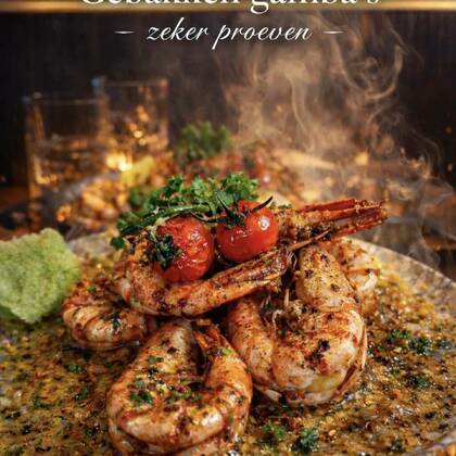 Gebakken gamba’s met lookboter (6 st.) of scampi’s (9 st.)